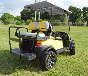 Yellow Club Car Precedent Golf Cart with ERIC smart charger at Key Largo Golf Carts